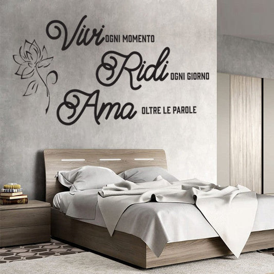Adesivo murale vivi ridi ama